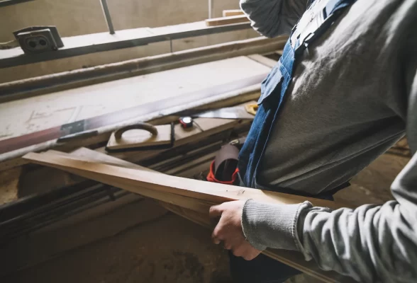 carpentry-concept-with-man-touching-wood carpentry-concept-with-man-touching-wood